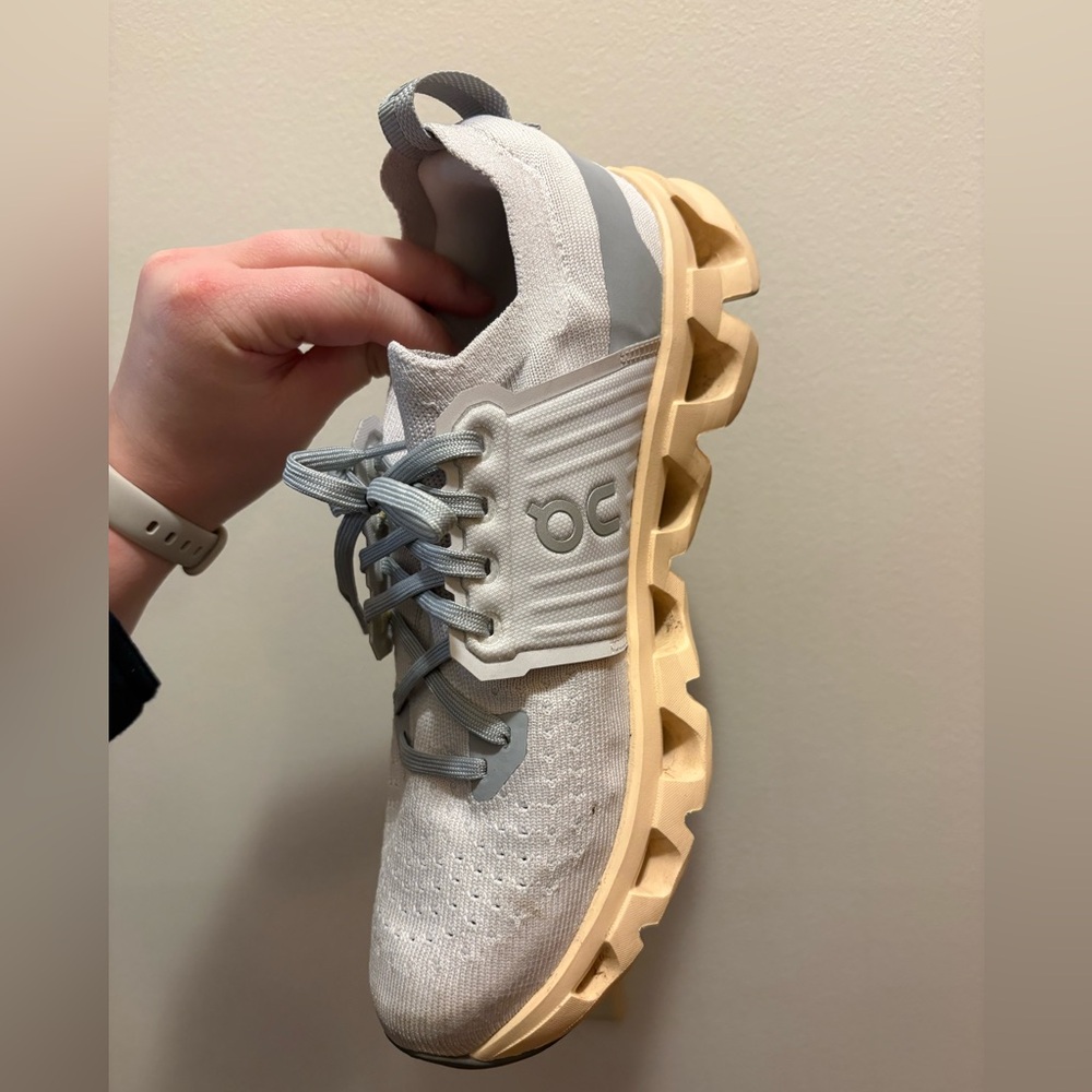 On cloud grey and peach shoes
